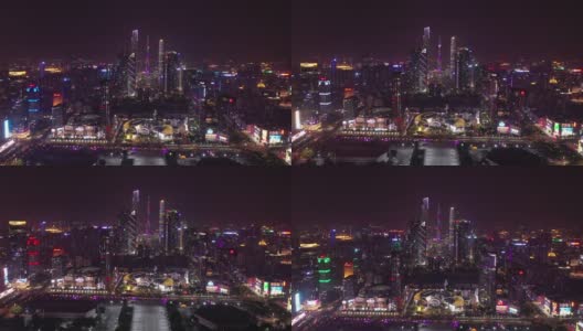 夜景时间照亮广州市市中心著名商场、交通街道航拍全景4k中国高清在线视频素材下载