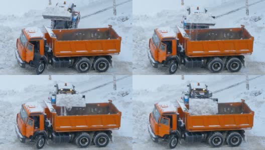 公用事业服务。一场大雪过后，要把道路上的积雪清理干净。拖拉机和翻斗车。高清在线视频素材下载