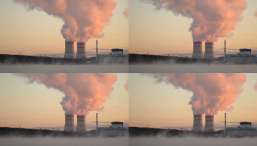 烟来自核电站的两条管道。工业、能源、生态高清在线视频素材下载