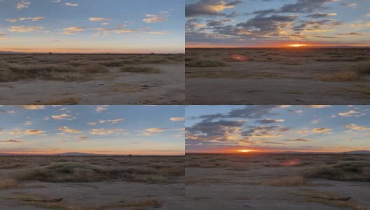 美丽的日出沙漠山脉地平线平移运动与太阳flair云和蓝色橙色天空垂直视频高清在线视频素材下载