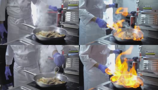 特写镜头。专业厨师用火焰烹饪海鲜。用火烹饪一道菜。厨师在厨房里把食物扔到煤气炉的火上做饭。高级餐厅的美食高清在线视频素材下载
