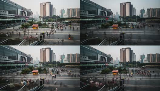 中国深圳，2014年11月21日:乘客们停留在中国深圳火车站和公交车站的广场上高清在线视频素材下载
