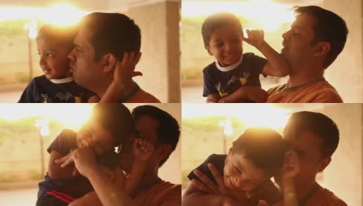 快乐的印第安孩子和他的父亲玩高清在线视频素材下载
