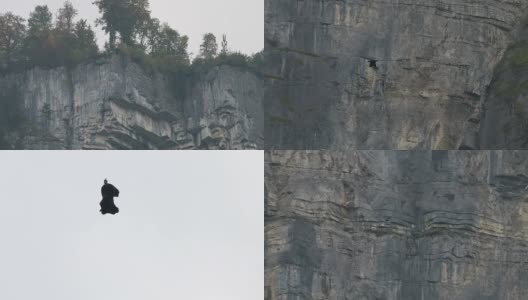 翼装飞行员从悬崖上下降，瞄准下面的山谷高清在线视频素材下载