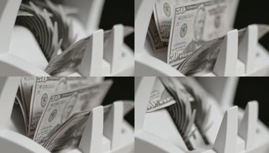 数钞机的叶轮推出了50美元的美钞高清在线视频素材下载