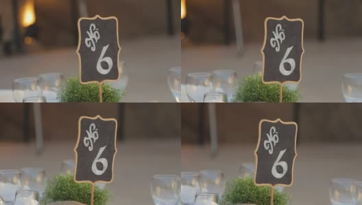 黑色婚礼的数字桌是6号的高清在线视频素材下载