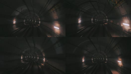 从一列行驶的火车前面看地铁隧道。快速的地下火车在现代城市的隧道中加速。巴塞罗那一列地下列车沿着其路线行驶的长镜头。4 k高清在线视频素材下载