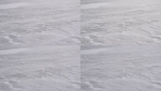 冬天被大风吹在冰上的飘雪高清在线视频素材下载