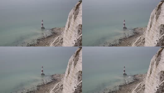 海滩头灯塔东苏塞克斯英国靠近伊斯特本和东七姐妹白垩悬崖高清在线视频素材下载