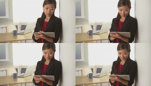成功的中国女商人用平板电脑高清在线视频素材下载