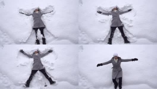 慢镜头:年轻女子在堆雪天使高清在线视频素材下载