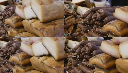 各种不同的熏香肠，意大利腊肠和培根出售。高清在线视频素材下载