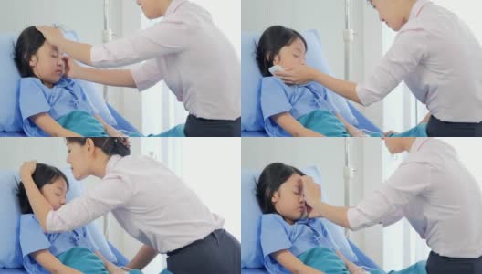 友善的医生给一个可爱的小女孩做例行检查。中国和香港的医疗系统高清在线视频素材下载