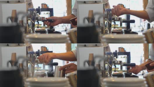 咖啡师将磨碎的咖啡压进Tamper的Portafilter来煮咖啡高清在线视频素材下载