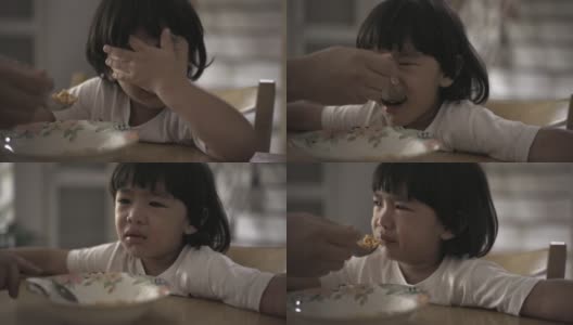 男孩哭着拒绝吃东西高清在线视频素材下载