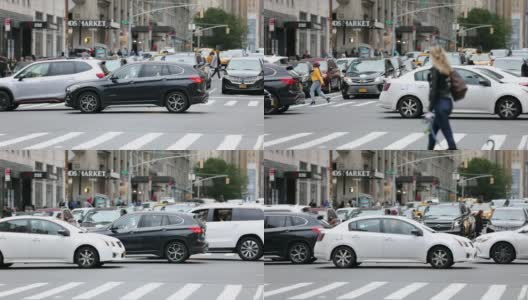 纽约曼哈顿，人们在尖峰时间过马路。卡车，出租车，公共交通，出租车背景高清在线视频素材下载