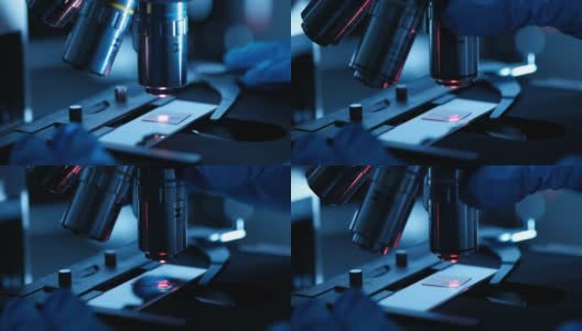 科学家正在生物实验室中使用显微镜高清在线视频素材下载