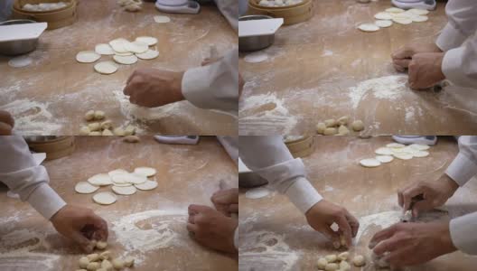 人们的动作是用手揉面和捏形来包饺子高清在线视频素材下载