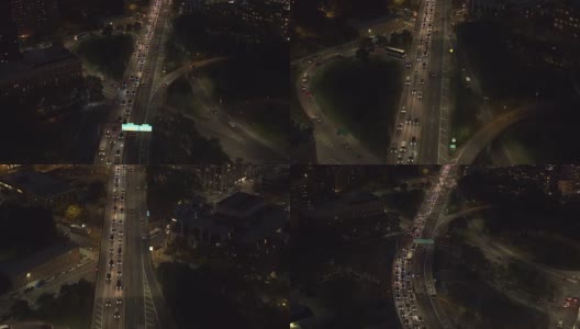 航拍:DUMBO街区布鲁克林大桥高速公路上，夜间交通十分拥挤高清在线视频素材下载