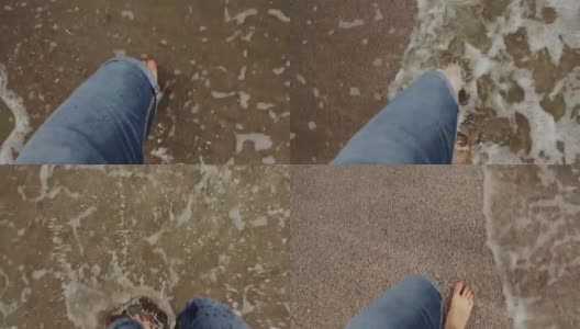 男人的脚在海滩上行走和跑步高清在线视频素材下载