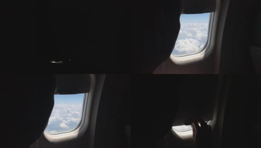 乘客的剪影向窗外看，关上了窗帘高清在线视频素材下载