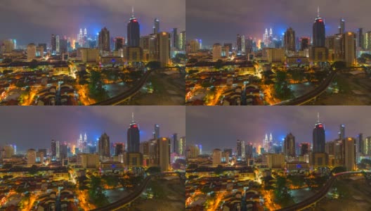 4K夜景延时:马来西亚吉隆坡的天空线和地铁天空列车高清在线视频素材下载