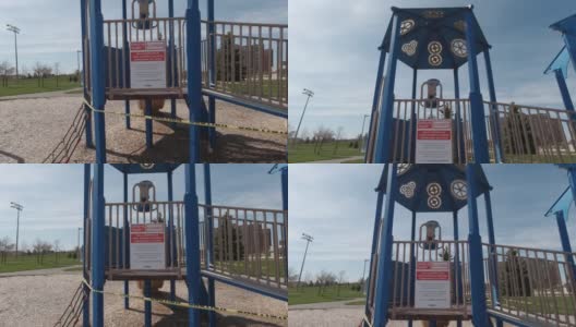 加拿大安大略省多伦多——2020年5月6日:按城市签名，COVID-19警报关闭，所有公园设施，包括游乐场关闭。练习身体距离，两米的距离。废弃的公园高清在线视频素材下载