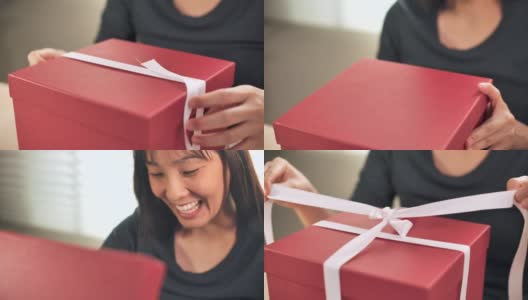 特写慢动作亚洲女人打开礼盒高清在线视频素材下载