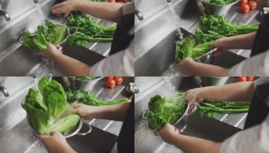 白人女厨师在餐厅厨房的滤锅里洗蔬菜高清在线视频素材下载