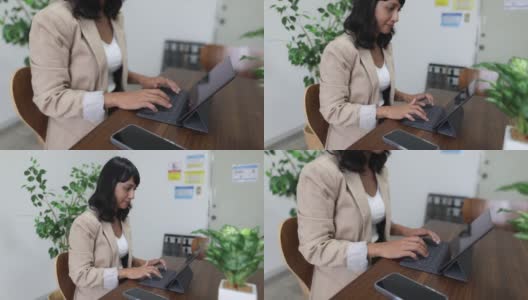 亚洲妇女在会议室工作，与同事交谈-第一部分高清在线视频素材下载