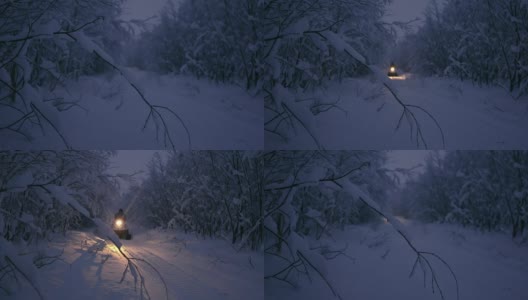 雪地摩托穿越森林高清在线视频素材下载