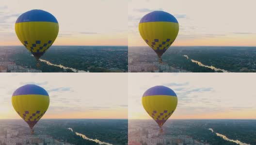 乘热气球飞向城市上空的日落，度假娱乐高清在线视频素材下载