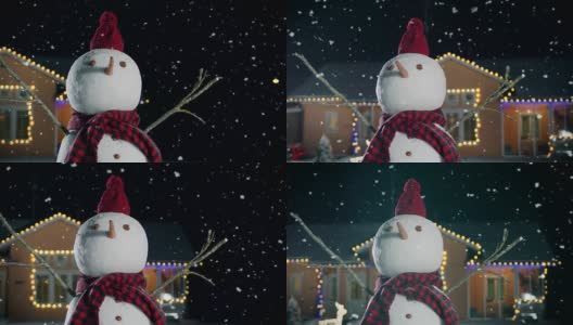 圣诞节前夕，戴着帽子和围巾的雪人站在装饰着花环的田园诗般的房子的后院。雪花在那个神奇的冬夜飘落。高清在线视频素材下载