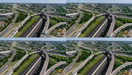 无人机向巨大的立交周转环和高速公路转变，德克萨斯州Autsin高清在线视频素材下载