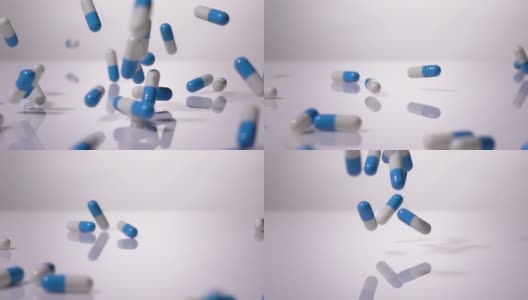 超级慢动作:白色背景上的蓝色胶囊滴高清在线视频素材下载