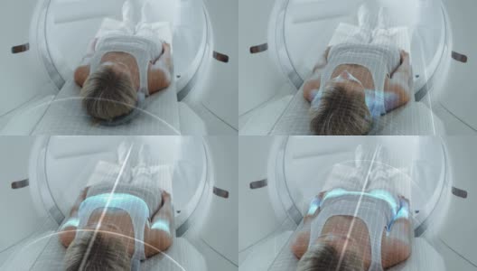 女性病人躺在CT或PET或MRI扫描床上，在扫描她的大脑和身体时在机器里移动。增强现实概念与视觉效果的医学实验室与高科技设备。高清在线视频素材下载