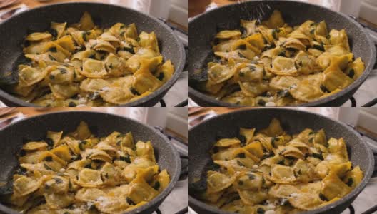 慢动作在意大利饺子、意大利乳清干酪和菠菜上放上帕尔马干酪高清在线视频素材下载