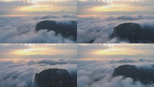 云海之上耸立着一座悬崖高清在线视频素材下载
