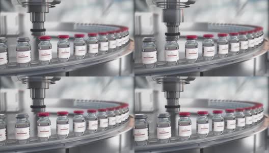 实验室大规模生产SARS-COV-2新型冠状病毒疫苗，在研究实验室的药品输送带上移动贴有品牌标签的瓶子。抗SARS-CoV-2的药物，可循环的视频高清在线视频素材下载