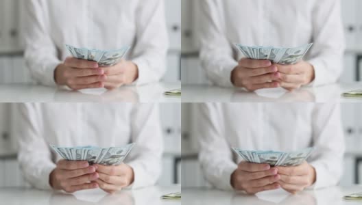 在桌子上数钞票的女人特写4k电影高清在线视频素材下载