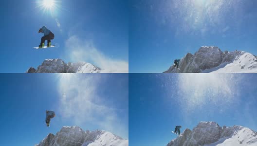 SLO MO滑雪板跳过蓝色清澈的天空高清在线视频素材下载