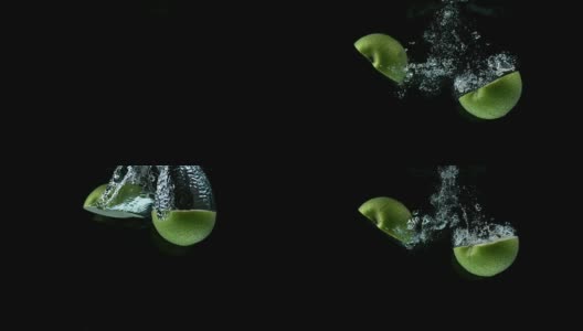 绿苹果，苹果，水果入水，黑色背景，慢镜头4K高清在线视频素材下载