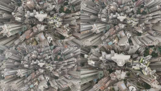 无人机俯瞰香港城市景观。从无人机拍摄的香港城市90度鸟瞰图。摄像机从下往上移动。高清在线视频素材下载