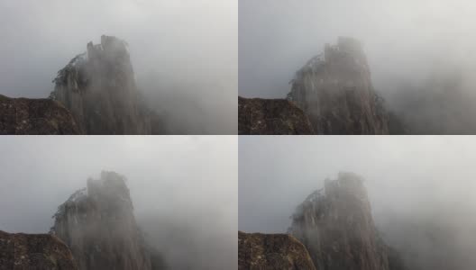 雾在山顶黄山或黄山与霜松，黄山，中国高清在线视频素材下载
