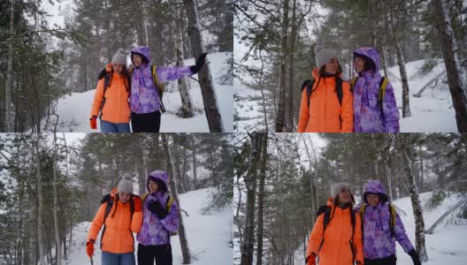两个年轻的姐妹走在令人惊叹的冬天的环境高清在线视频素材下载