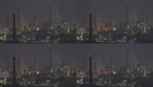 石化工厂和炼油工业夜间鸟瞰图高清在线视频素材下载