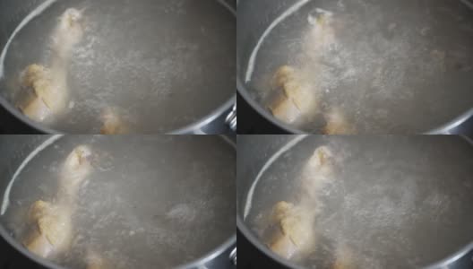 用沸水烧开的平底锅煮一片肉高清在线视频素材下载
