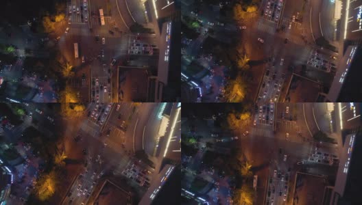 青岛市黄昏夜晚，照亮市中心交通街道十字路口高空俯仰全景4k中国高清在线视频素材下载