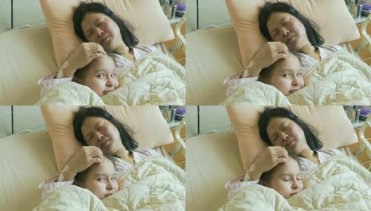 小女孩躺在病床上安慰生病的母亲高清在线视频素材下载