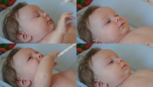 用液体药物喂养婴儿高清在线视频素材下载
